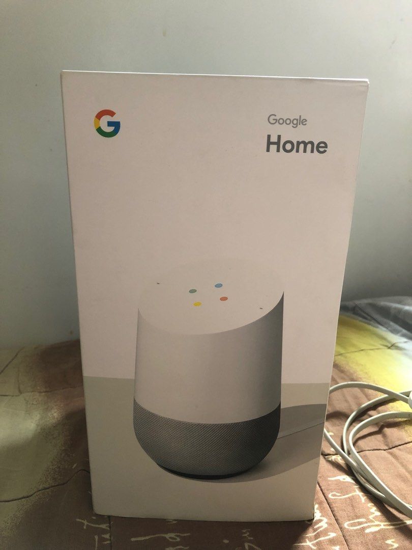 Google Home Smart Speaker (Category: Soundbars, Speakers & Amplifiers) located in Bulacan. Submitted by nanadizo31-35308 (Listing ID 1403168889, Image 2). Description: - Google Home smart speaker - Includes original box and power adapter - Color: White speaker with gray fabric base.