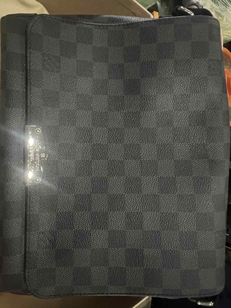 LOUIS VUITTON Damier Graphite Canvas District PM Messenger Bag (Category: Luxury Bags & Wallets) located in Manila. Submitted by nhicamarasigan3932 (Listing ID 1403139123, Image 1). Description: LOUIS VUITTON Damier Graphite Canvas District PM Messenger Bag.