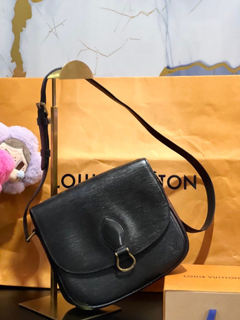 Louis Vuitton Epi Leather Shoulder Bag (Category: Luxury Bags & Wallets) located in Bulacan. Submitted by gcdeclutters_malolosbulacan (Listing ID 1403101117, Image 1). Description: 🖤 Louis Vuitton Saint-Cloud in Epi Leather P29,000. Elegant, structured, and timeless — the perfect everyday crossbody 💼✨ ✅ Authentic LV Epi Leather with Entrupy Certificate ✅ Adjustable strap & gold hardware ✅ Clean interior, excellent condition ✅ Classic minimalist