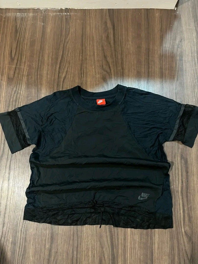 Nike Black Top Mesh for Women (Category: Tshirts & Polo Shirts ) located in Manila. Submitted by jethriftock (Listing ID 1398660916, Image 1). Description: - Black Nike Mesh - Mesh design on sleeves and bottom hem - Small Nike logo on front - Mesh panel across upper back - Round neckline - Short sleeves.