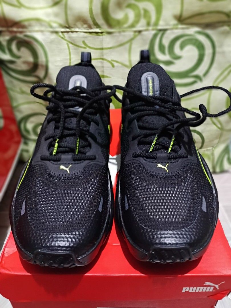 Puma Velocity Nitro 2 Black Sneakers (Category: Sneakers) located in Manila. Submitted by cherissa (Listing ID 1403122159, Image 2). Description: - Puma Velocity Nitro 2 sneakers - Color: Black with neon yellow accents - Features Puma logo - Size: US 4, EUR 36, CM 23 - Mesh upper - Cushioned sole - Includes original box.