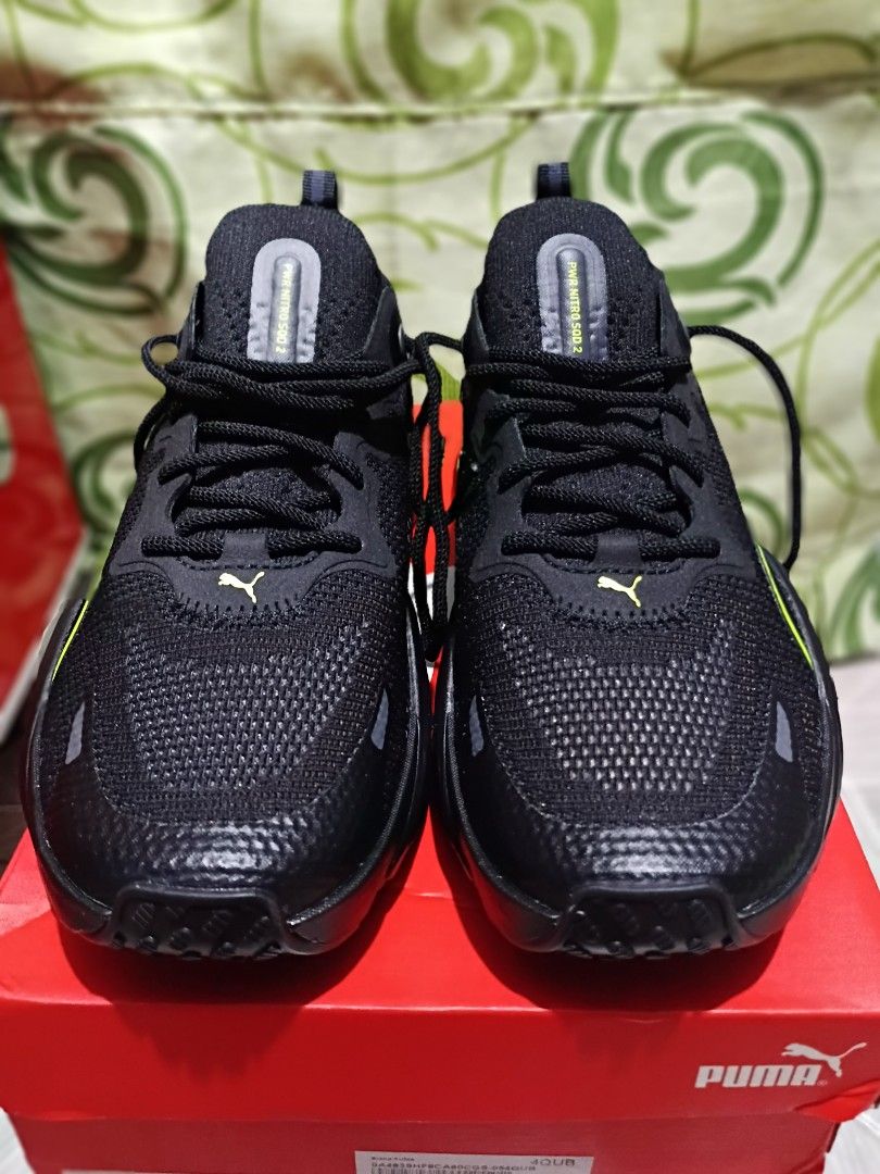 Puma Velocity Nitro 2 Black Sneakers (Category: Sneakers) located in Manila. Submitted by cherissa (Listing ID 1403122159, Image 3). Description: - Puma Velocity Nitro 2 sneakers - Color: Black with neon yellow accents - Features Puma logo - Size: US 4, EUR 36, CM 23 - Mesh upper - Cushioned sole - Includes original box.