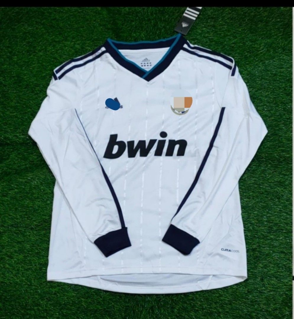 Real Madrid home vintage long sleeve jersey 12/13 (Category: Activewear) located in Singapore. Submitted by hoodiepl (Listing ID 1403175488, Image 1). Description: brand new size S M L XL avail item be sending using tracking mail takes 1-3 working days no meet up no self-collect.
