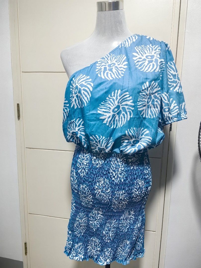 Shein One Shoulder Dress XL (Category: Dresses) located in Quezon City. Submitted by selle_corpus (Listing ID 1403140486, Image 2). Description: - Shein one-shoulder dress - Size: XL - Color: Blue and white pattern - Design: Shirred bodice and skirt - Material: 100% polyester - Half Smocking Dress.