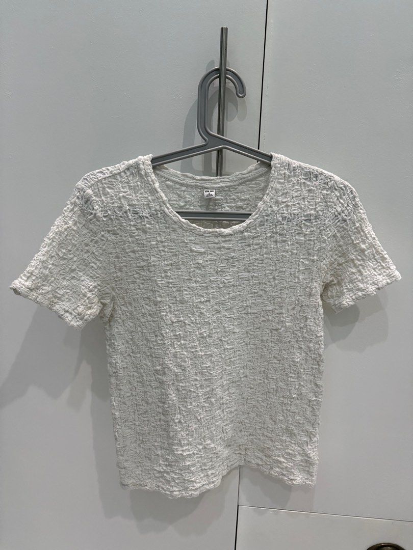 Uniqlo Textured Crew Neck Top (Category: Blouses) located in Antipolo. Submitted by sailed.items (Listing ID 1403148067, Image 1). Description: - Uniqlo white crew neck top - Size: Medium - Made in Vietnam - Original - No issues, perfectly in good condition.