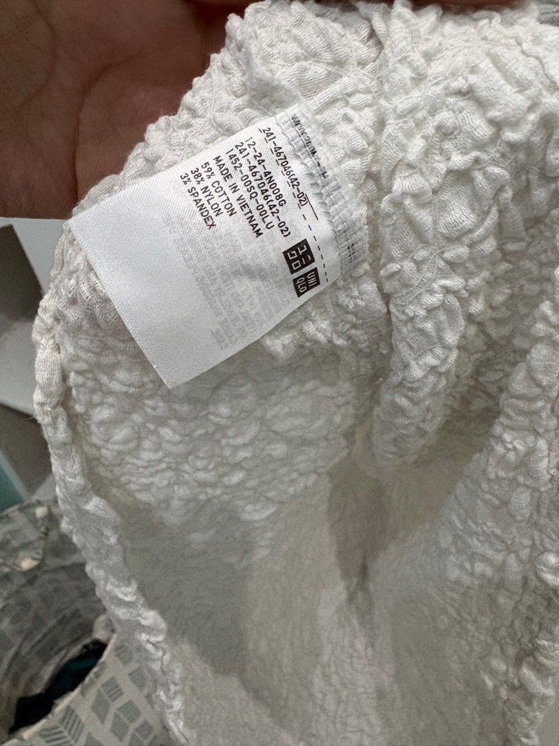 Uniqlo Textured Crew Neck Top (Category: Blouses) located in Antipolo. Submitted by sailed.items (Listing ID 1403148067, Image 3). Description: - Uniqlo white crew neck top - Size: Medium - Made in Vietnam - Original - No issues, perfectly in good condition.
