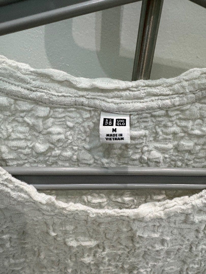 Uniqlo Textured Crew Neck Top (Category: Blouses) located in Antipolo. Submitted by sailed.items (Listing ID 1403148067, Image 2). Description: - Uniqlo white crew neck top - Size: Medium - Made in Vietnam - Original - No issues, perfectly in good condition.