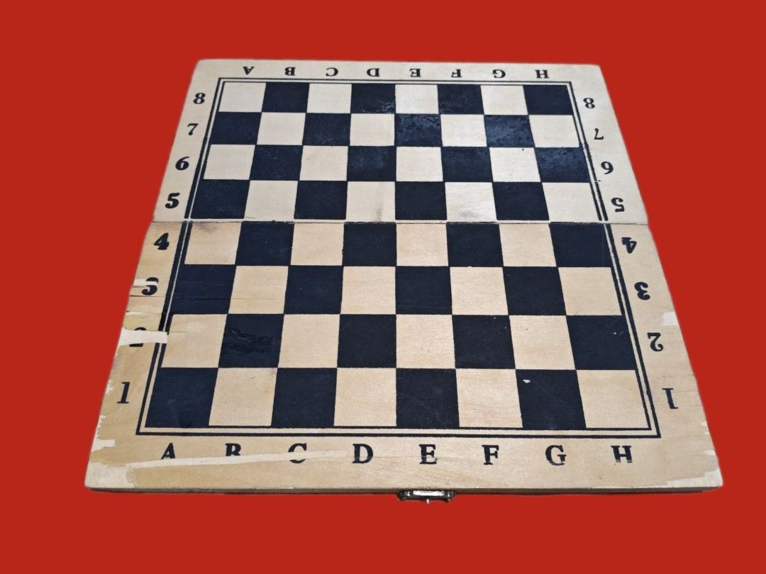 Wooden Chess Set with Pieces (Category: Board Games & Puzzles) located in Marikina City. Submitted by irineb (Listing ID 1403096270, Image 1). Description: 👉🏼good finds!!!👌!!! Wooden chess set - Black and white chess pieces -Size :small - Folding board for compact storage - Pieces stored in individual plastic bags - Board features letter and number markings - Complete set, ready to play visible scaled on sides RFS:decluttering MOP:gcash MOD:fo