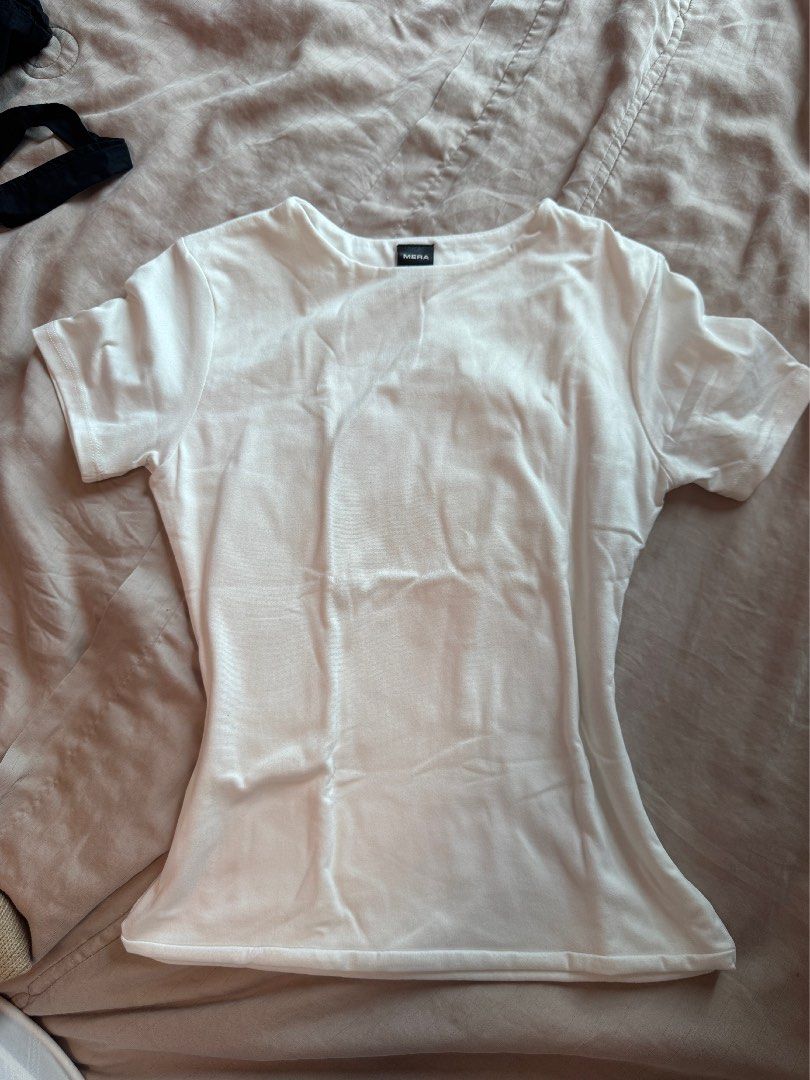 Zara & MERA Ribbed Crop Top (TAKE 3) (Category: Sleeveless) located in Manila. Submitted by hristt (Listing ID 1403096593, Image 2). Description: - Zara ribbed crop top - Crew neck - Short sleeves - Colors: White and Beige - Ribbed material - Perfect for layering or casual wear - Versatile wardrobe piece.
