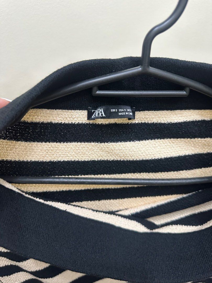 Zara Striped Knit Skirt - Size S (Category: Skirts) located in Manila. Submitted by traderjoe_ (Listing ID 1403205704, Image 2). Description: - Zara knit skirt - Black and cream stripes - High, folded neckline - Bodycon style - Size S - Made in China.