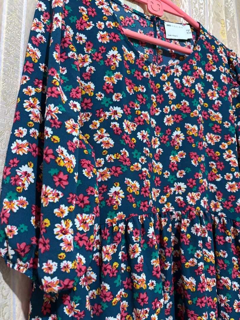 ASOS Design Floral Dress (Category: Dresses) located in Taguig. Submitted by chic_fleuriste (Listing ID 1407255252, Image 2). Description: - ASOS Design floral dress - Dark teal background with vibrant floral pattern - Relaxed fit - Size: UK 8, US 4, EUR 36 - Made in Bulgaria - Perfect for casual or special occasions.