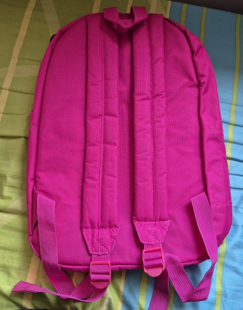 Backpack - Simple & Functional (Category: Backpacks) located in Singapore. Submitted by wickycloud (Listing ID 1407238523, Image 3). Description: - Vibrant pink backpack - Large main compartment - Front zippered pocket for easy access - Internal pocket for organization - Lightweight and easy to carry.