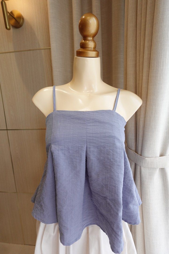Bangkok top (Category: Sleeveless) located in Cabanatuan. Submitted by riveraaly (Listing ID 1407251764, Image 2). Description: Blue Bought in Bangkok Really nice top, stretchy at the back Too tight on the chest part for me.