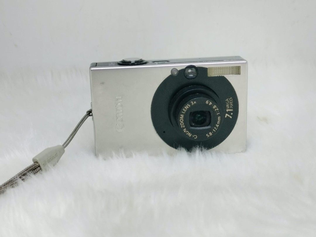 Canon IXY DIGITAL 10 Camera rare (Category: Cameras) located in Manila. Submitted by ultimogizmos (Listing ID 1407239376, Image 1). Description: - Canon IXY DIGITAL 10 digital camera - 7.1 Megapixels - Zoom lens - Silver color - Includes wrist strap - Screen displays 'No memory card' - Buttons: ISO, Function Set, Display, Menu issue burn lcd won't affect performance output.