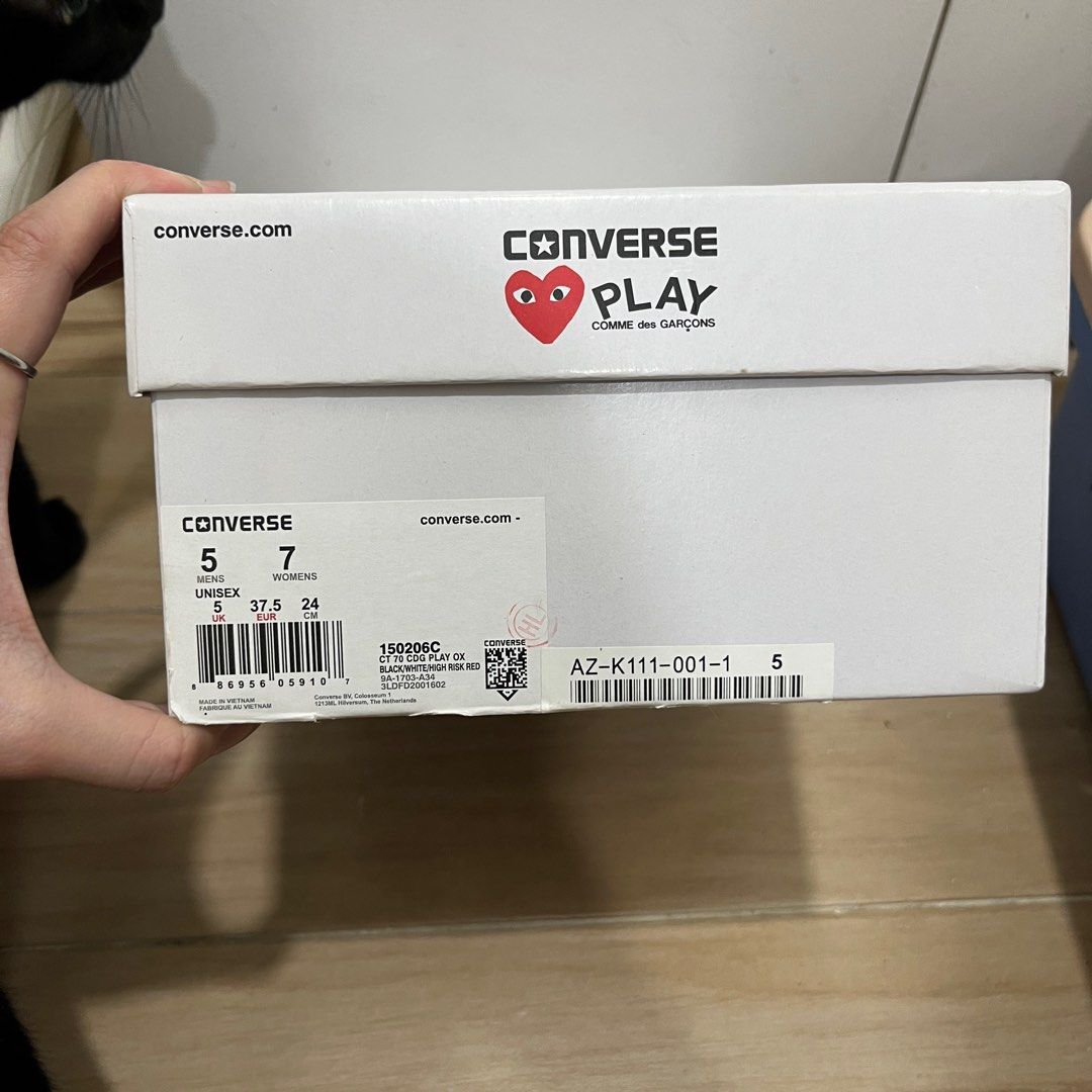 Authentic Converse CDG w/ Orig Box (Category: Sneakers) located in Taguig. Submitted by _handydandy (Listing ID 1407310530, Image 2). Description: - Rfs: Not being used anymore - Honest flaws: rubber sides not sticking anymore; can be fixed with regluing services - Slight yellowing - 24cm / US 7 women’s - Authentic Converse Play Comme des Garcons Chuck Taylor sneakers - Features the iconic heart with eyes logo - Black canvas upper - White laces -