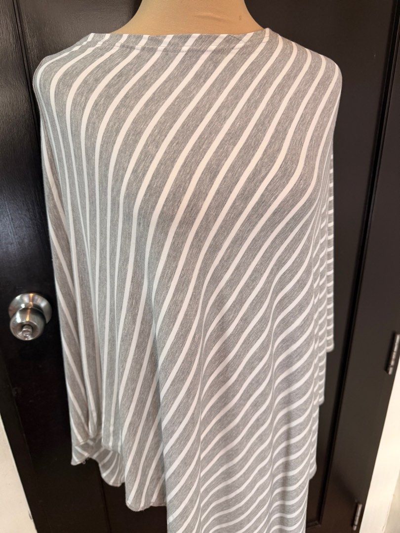 Cuddle Tots Nursing Cover - Gray Stripes (Category: Maternity Care) located in Quezon City. Submitted by ladymadness (Listing ID 1407379154, Image 2). Description: Breastfeeding / Nursing Cover Poncho — Gray Stripes • Free size – easy to wear and lightweight • 360° coverage for discreet nursing • Can also be used as a stroller/car seat cover • Gray + white stripes (neutral and easy to match) • In excellent condition, barely used • Selling to decl