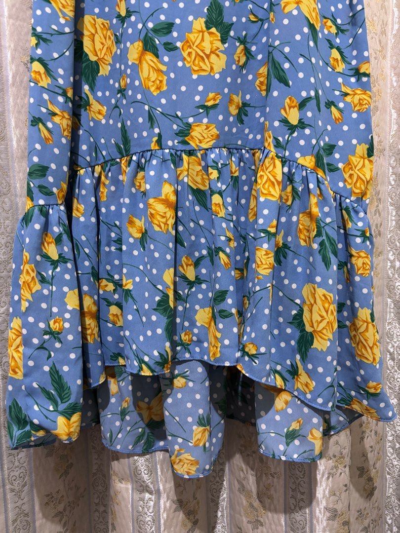 Floral Print Spaghetti Strap Dress (Category: Dresses) located in Taguig. Submitted by chic_fleuriste (Listing ID 1407255479, Image 2). Description: - Floral print dress with yellow roses and white polka dots - Spaghetti strap design - Ruffled hem - V-neckline - Flowy silhouette - Lightweight fabric, perfect for warm weather.