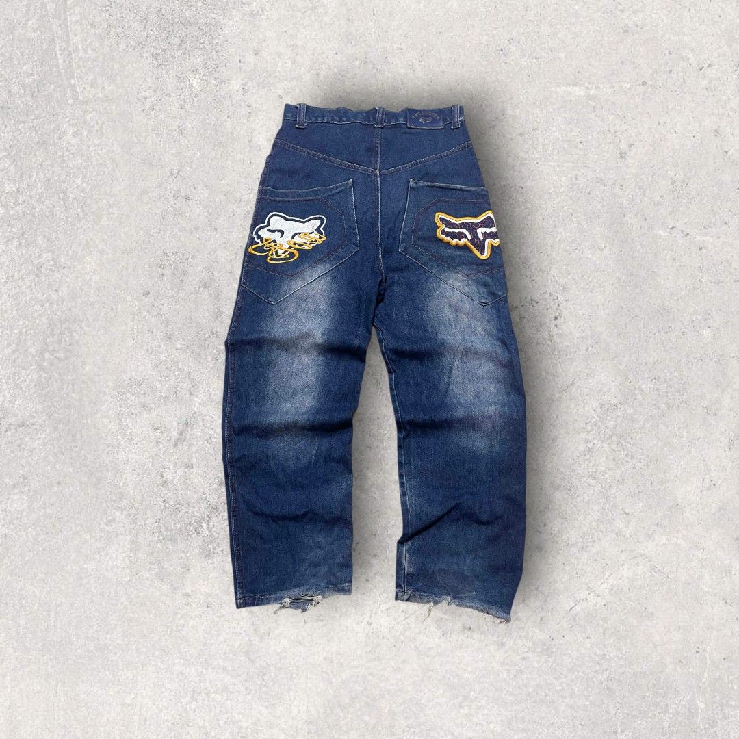 Fox Embroided Jeans (Category: Jeans) located in Manila. Submitted by _getsomegoods (Listing ID 1407373247, Image 2). Description: Fox Racing Embroided Big Pocket Jeans 32 Waist 41 Length 12 Thigh 9 Leg Opening Issue: Distressed, missing button and mini pin holes.