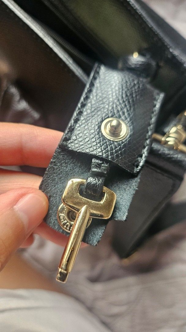 Furla Metropolis Satchel (Category: Luxury Bags & Wallets) located in San Juan City. Submitted by mjdeclutters (Listing ID 1407258360, Image 3). Description: Furla Metropolis Satchel - Top handle and detachable shoulder strap - Includes key and twilly (due to leather handle problems) - Authentic - Personal preloved - flaws due to storage see 5th and 6th pics.