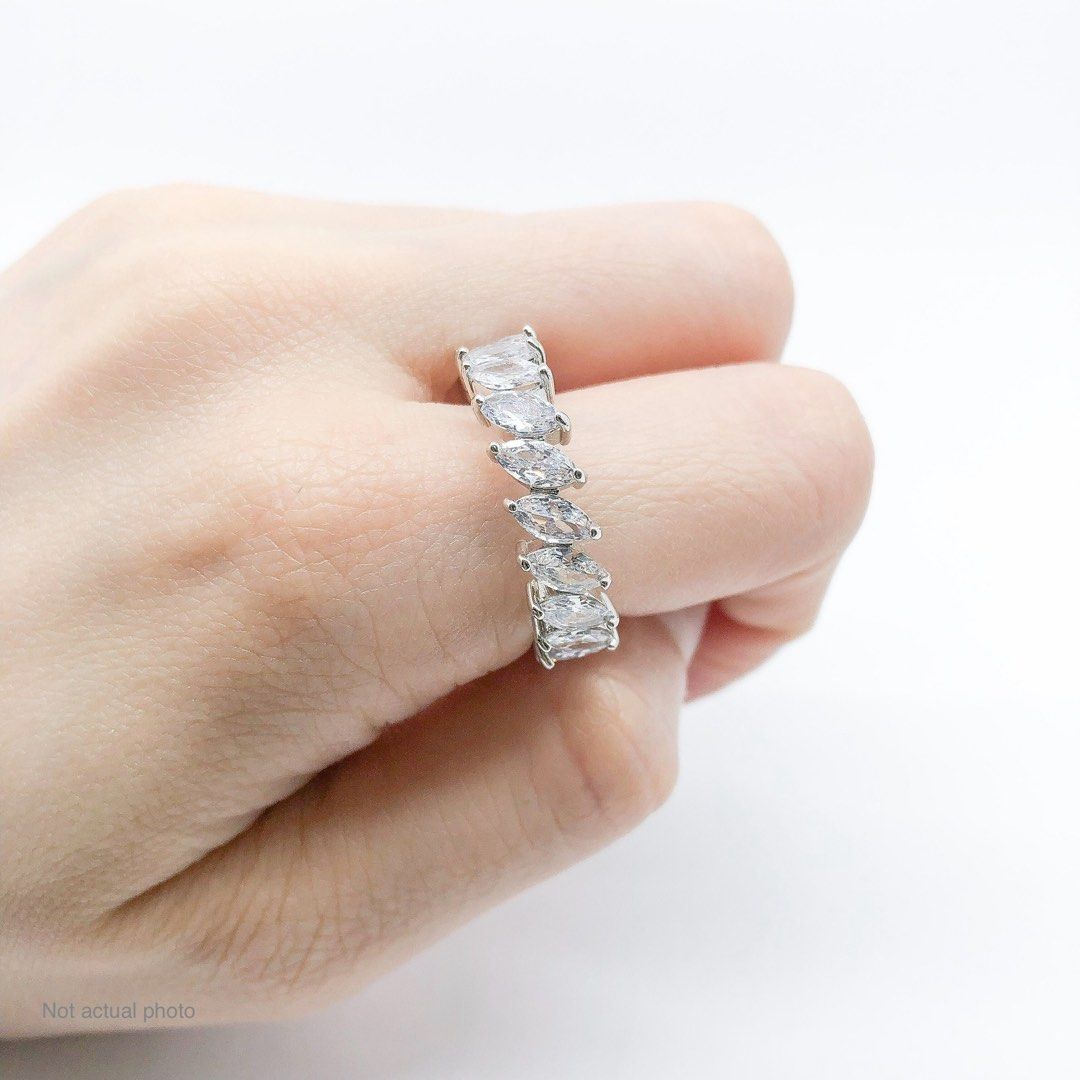 Garnet ring (Category: Rings) located in Manila. Submitted by jmacg (Listing ID 1407278458, Image 2). Description: Eternity ring marquise stone shape. Stone size: 5 mm. Ring size: ~size 6. Comes with a box. Material: Cubic zirconia on rhodium plated brass. Has discoloration.