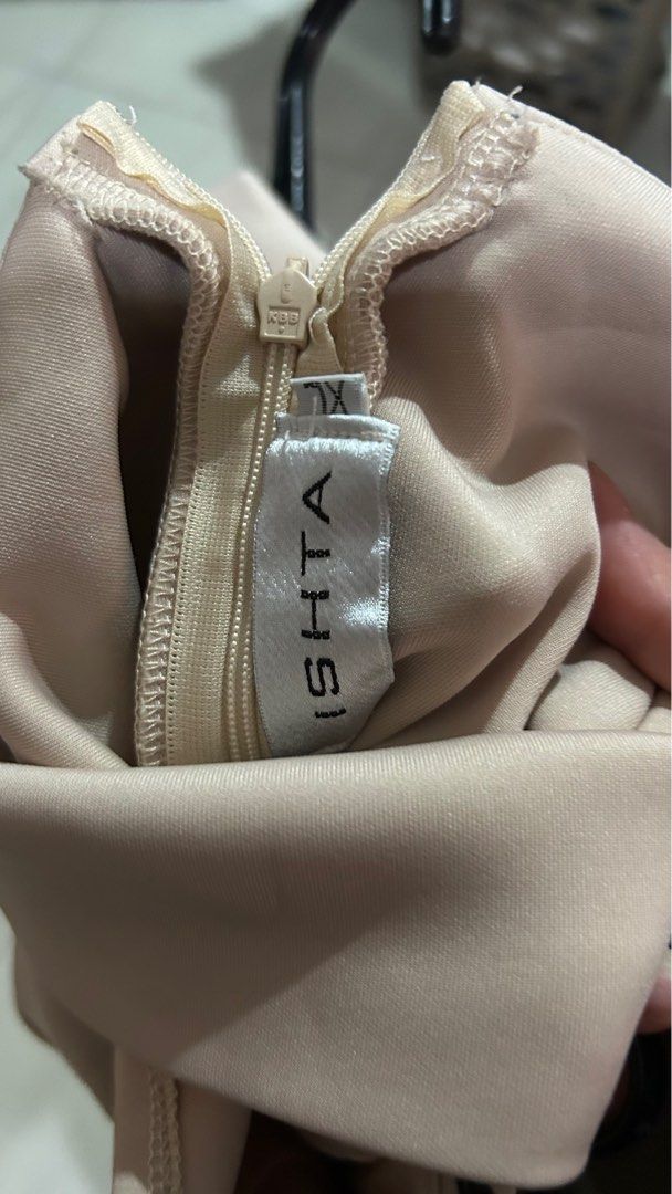 ISHTA Beige Maxi Neoprene - XL (Category: Dresses) located in Pasig City. Submitted by eenamagg (Listing ID 1407285115, Image 3). Description: - ISHTA beige maxi dress - Size: XL - Features a unique cross-back design - Zipper closure - Floor-length - Ideal for special occasions and formal events.