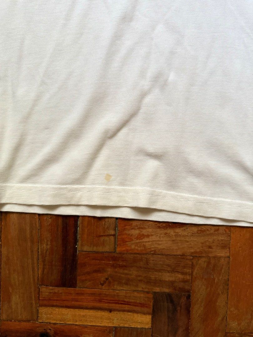 Lacoste white shirt (Category: Tshirts & Polo Shirts ) located in Quezon City. Submitted by reidify (Listing ID 1407199562, Image 3). Description: Size L original removable stains.