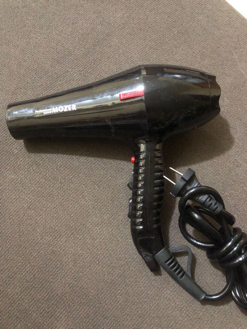 Mozer Professional Hair Dryer (Category: Hair) located in Pasig City. Submitted by boundless93 (Listing ID 1407342838, Image 1). Description: Preowned Mozer professional hair dryer Hot and cold settings Seldom used.