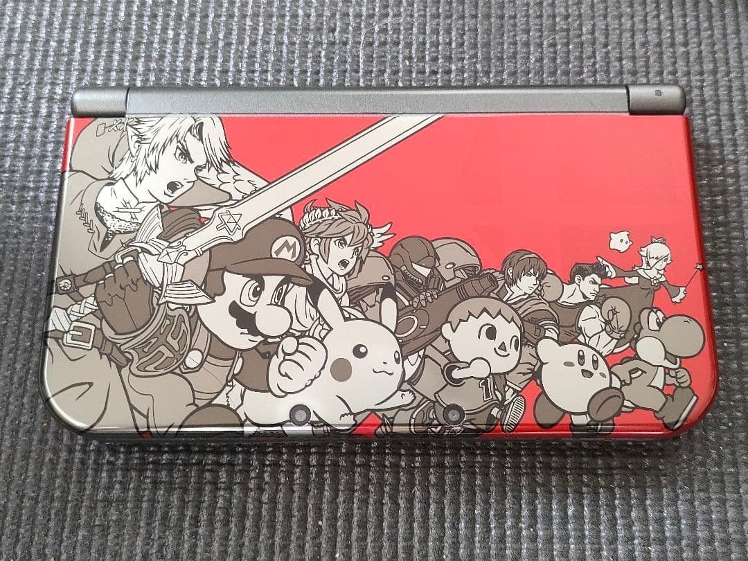 New Nintendo 3DS LL Super Smash Bros. Edition (Category: Nintendo) located in Manila. Submitted by japan_treasure (Listing ID 1407334569, Image 3). Description: there are some scratches and dirt. There are noticeable scratches or stains..