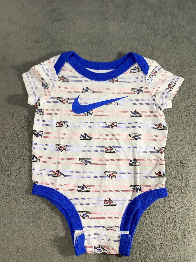 Nike onesie 3M on tag (Category: Babies & Kids Fashion) located in Binan City. Submitted by _bevalmazora (Listing ID 1407335143, Image 1). Description: - Brand: Nike - Color: white w blue lining - Excellent condition - Stylish design - Durable material.