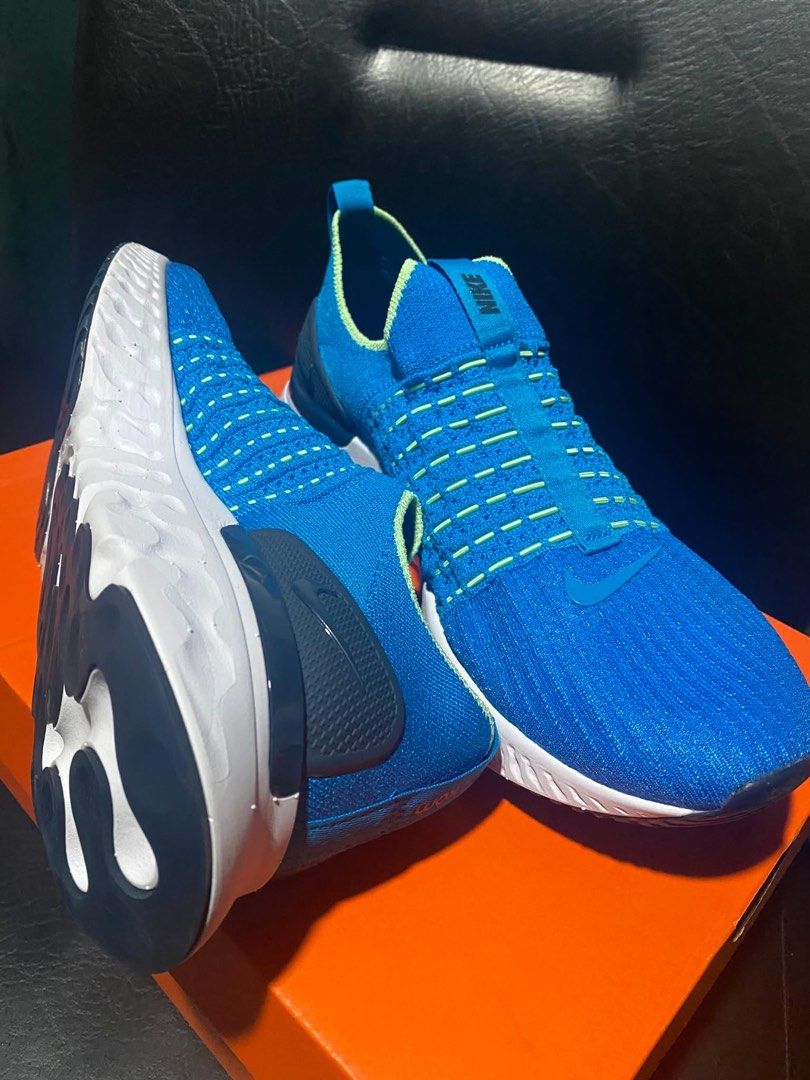 Nike React Phantom Run FK 2 - Blue Orbit (Category: Sneakers) located in Valenzuela. Submitted by padillajaz62056 (Listing ID 1407208931, Image 3). Description: SALE PRICE: ₱3,000 RUSH ‼️‼️SRP: ₱7,195 - Nike React Phantom Run FK 2 - Size: US 11.5, UK 9, EUR 44 - Color: Blue upper with white sole - Features: Slip-on design, Nike swoosh, "Nike React" logo - Made in Vietnam .