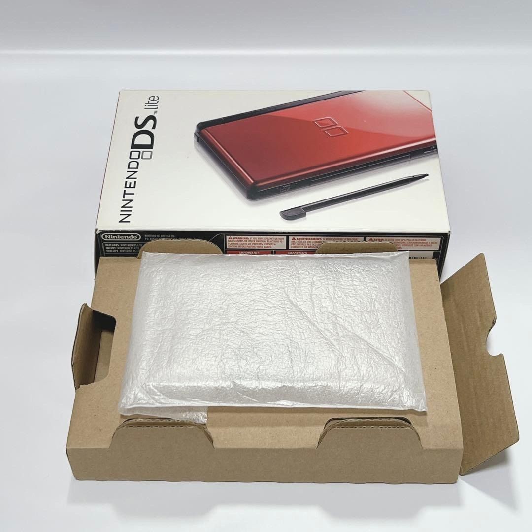 North American Version Nintendo DS Lite Light Red [Excellent Condition] (Category: Nintendo) located in Manila. Submitted by japan_treasure (Listing ID 1407303016, Image 3). Description: 【merchandise】 Nintendo DS Lite Red North American version 【accessories】 ・Main unit ・Two touch pens ・Charger ・Paper ·box ・Inner box *Everything in the photo is included. *Software is not included. 【situation】 Exterior There are some small scratches when held up to