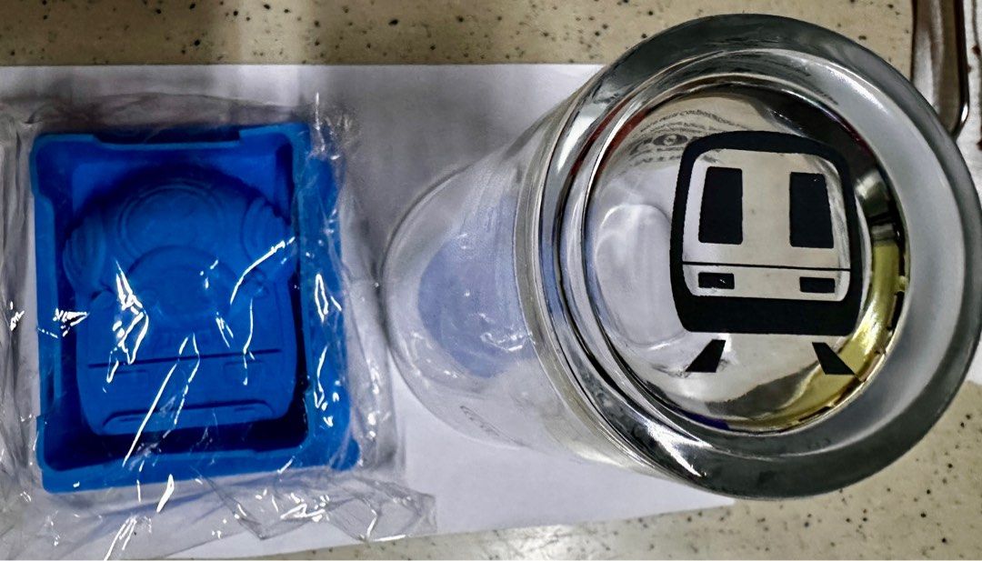 One piece glass with Ice cube tray - Chopper (Category: Water Bottles & Tumblers) located in Manila. Submitted by kurokaoru (Listing ID 1407239881, Image 3). Description: Unused brand new One Piece Chopper Glass Cup with ice cube tray Box has aged a little but the glass cup is spotless From Hong Kong MTR.