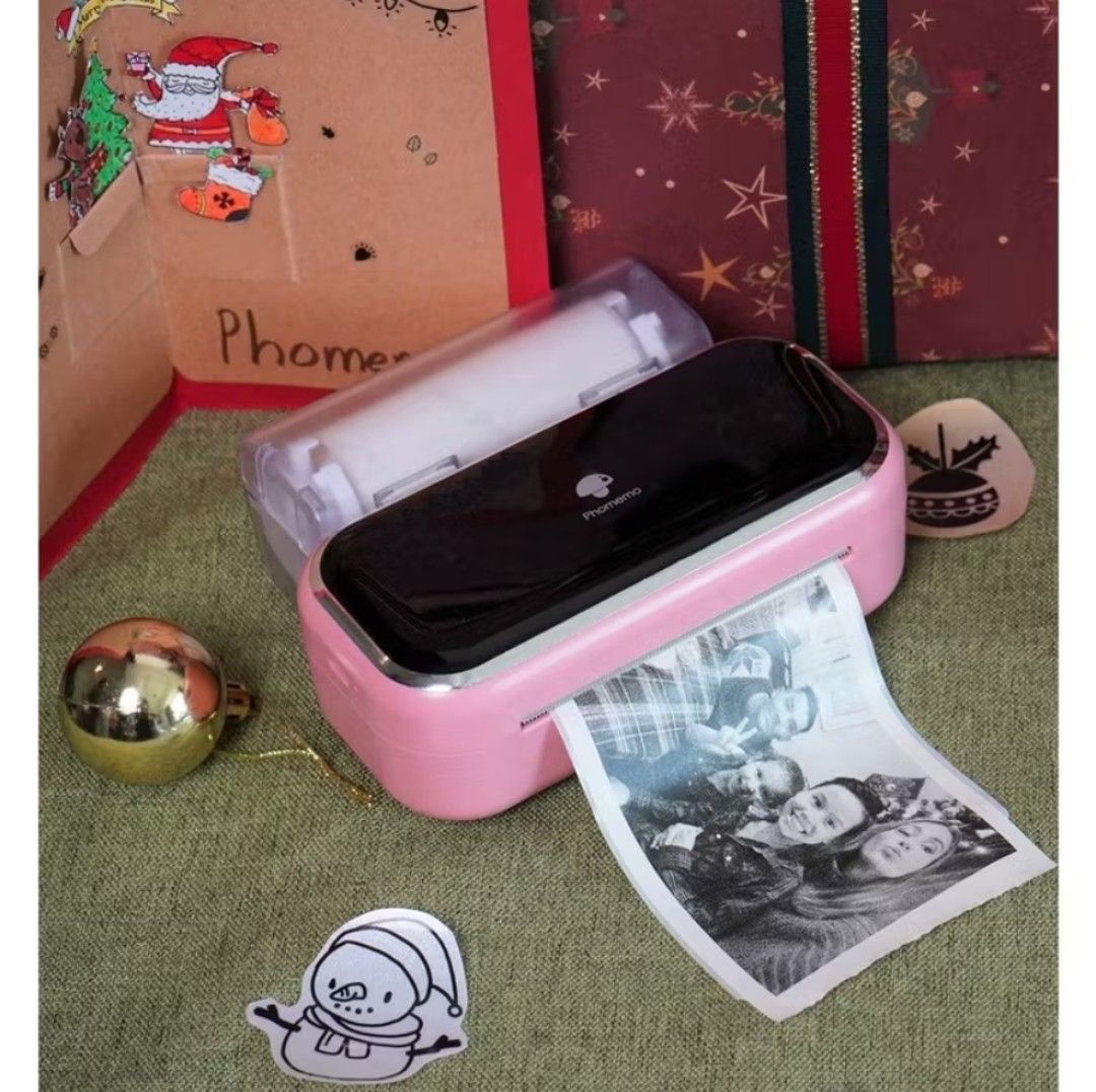 Phomemo M03 Bluetooth Mini Printer ( without Thermal paper) (Category: Printers, Scanners & Copiers) located in Pasig City. Submitted by timelesstrend.ph (Listing ID 1407227482, Image 1). Description: COLOR: PINK W/OUT THERMAL PAPER NEGOTIABLE PM FOR ACTUAL PICTURE. Hand-Hold Mini Printer: 145x70x54mm size and weighing only 450g, allowing you to print anytime, anywhere. Powerful Label Creation Capability: Easily create stickers for various scenar