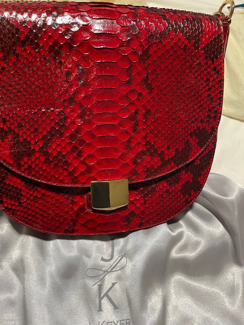 leather bag (authentic python leather) (Category: Cross-body Bags) located in Singapore. Submitted by funshine4 (Listing ID 1407357012, Image 4). Description: Real python leather. Bought from local Singapore shop. Shop currently at Great World City. Willing to sell much lower for a quick sale to declutter. .