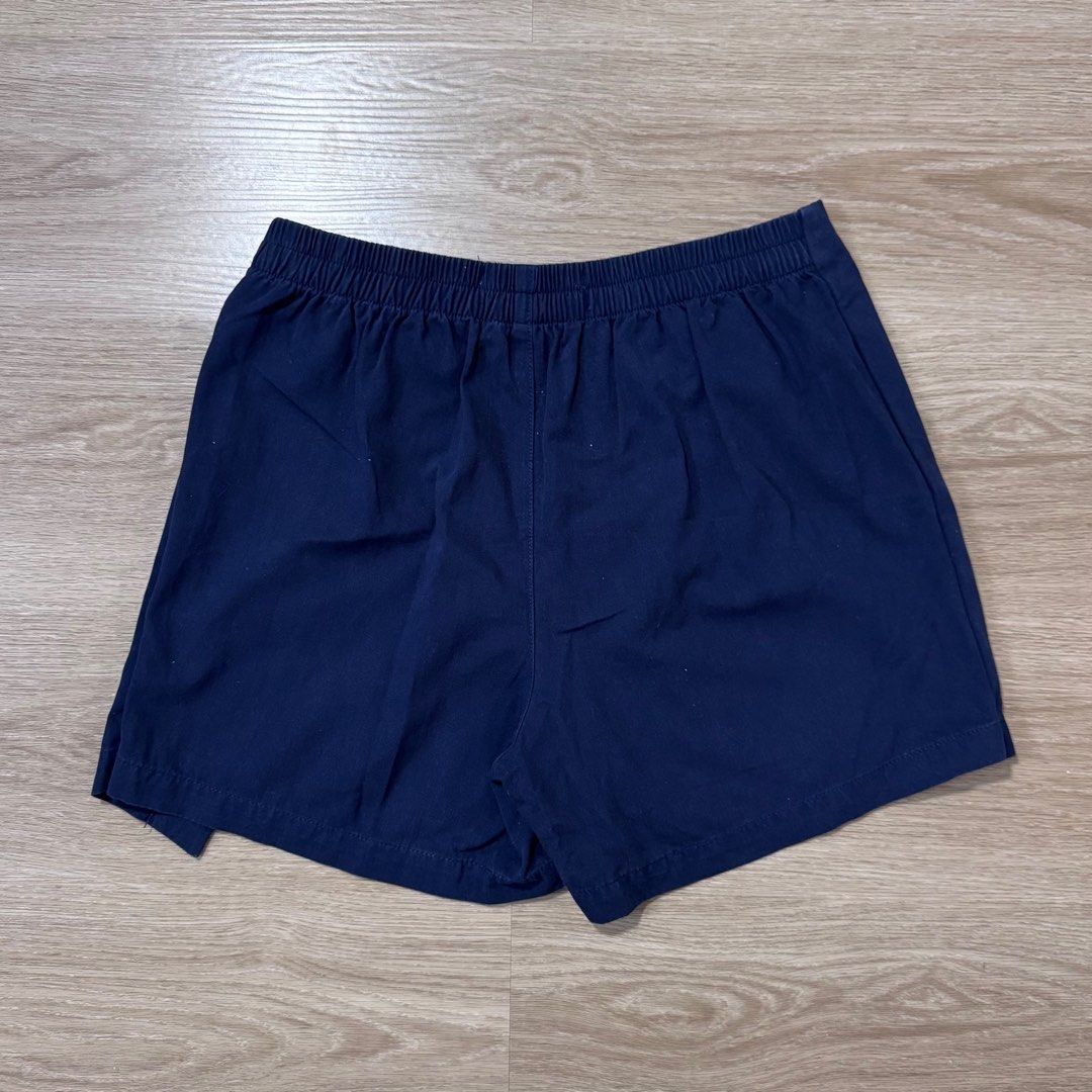 Regatta Navy Blue Skorts - Size M (Category: Shorts) located in Calamba. Submitted by happymom02 (Listing ID 1407220404, Image 2). Description: - Regatta navy blue skort - Size: M - Features an elastic waistband - Wrap-around design - Perfect for casual wear - Comfortable and stylish.