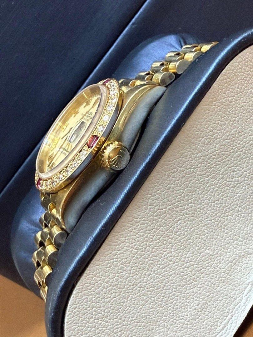 Rolex Lady-Datejust (Category: Luxury Watches) located in Manila. Submitted by annafinds (Listing ID 1407364482, Image 3). Description: R0/ex Lady-Datejust, 18k solid yellow gold, diamond, and ruby-set wristwatch with a champagne dial and a President bracelet. 535k Open for layaway. Disclaimer: We are not affiliated, associated, authorized, endorsed by or in any way officially connected with any other company or luxury brand. All copyrights are r