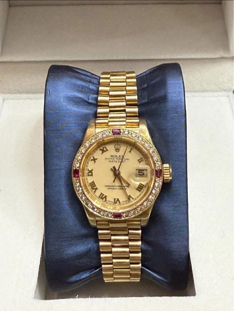Rolex Lady-Datejust (Category: Luxury Watches) located in Manila. Submitted by annafinds (Listing ID 1407364482, Image 2). Description: R0/ex Lady-Datejust, 18k solid yellow gold, diamond, and ruby-set wristwatch with a champagne dial and a President bracelet. 535k Open for layaway. Disclaimer: We are not affiliated, associated, authorized, endorsed by or in any way officially connected with any other company or luxury brand. All copyrights are r