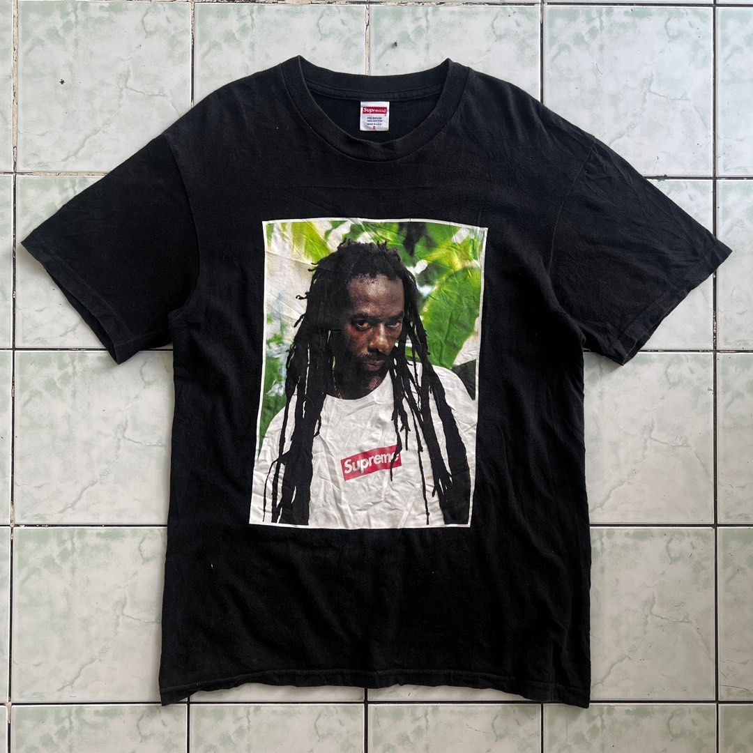 Supreme Buju banton Tee Photo Print (Category: Tshirts & Polo Shirts ) located in Imus. Submitted by cedrickger51562 (Listing ID 1407261828, Image 1). Description: Supreme Buju Banton Tee Small on tag Dimes : W : 19 L : 27 Excellent Condition Color rate : 9.3/10 Issue : Have minimal crack print & need wash .