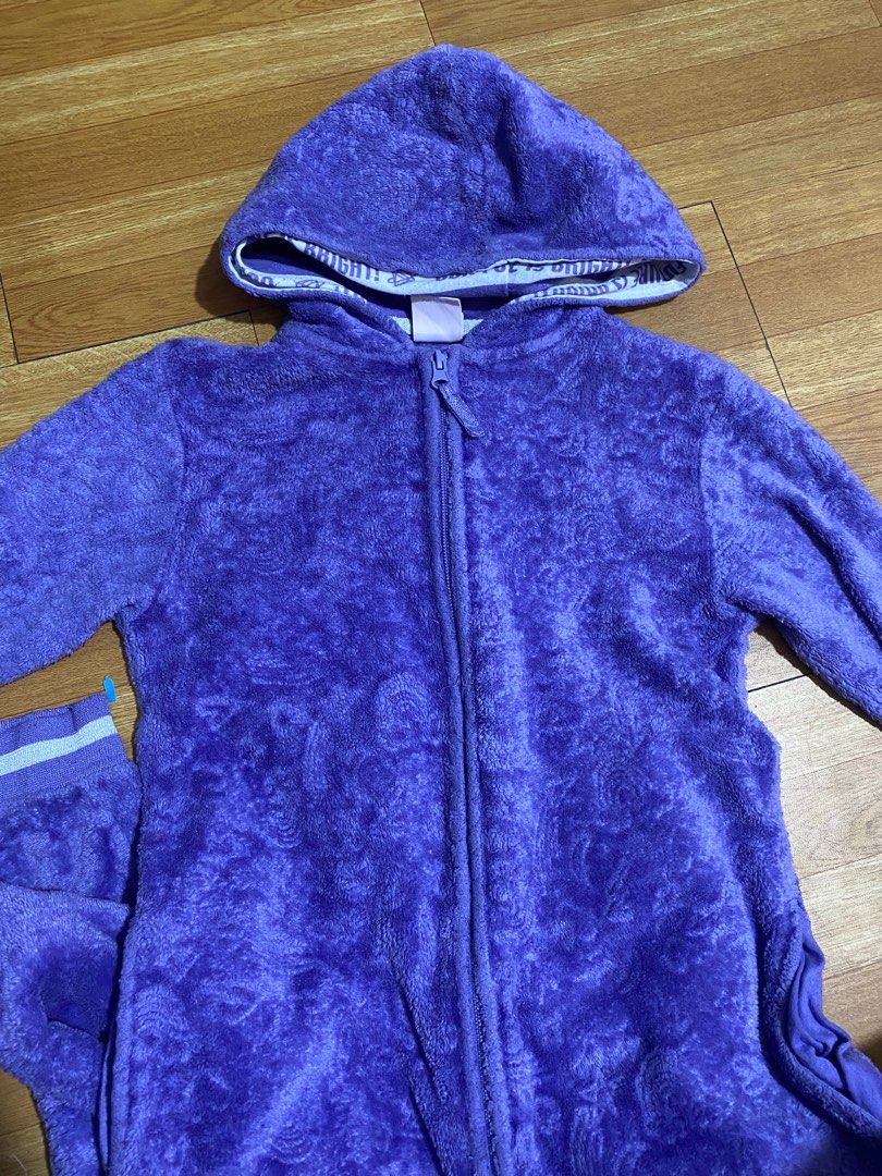 Take all 3 for kids onesies (Category: Babies & Kids Fashion) located in Taguig. Submitted by gzcollections (Listing ID 1407293418, Image 2). Description: - Kids' onesies, perfect for ages 7-8. - Available designs: - Purple Care Bear onesie - Yellow cat hood with unicorn/smiley face pattern - Features: - Zip-up front - Hood - Ideal for lounging or sleepwear..
