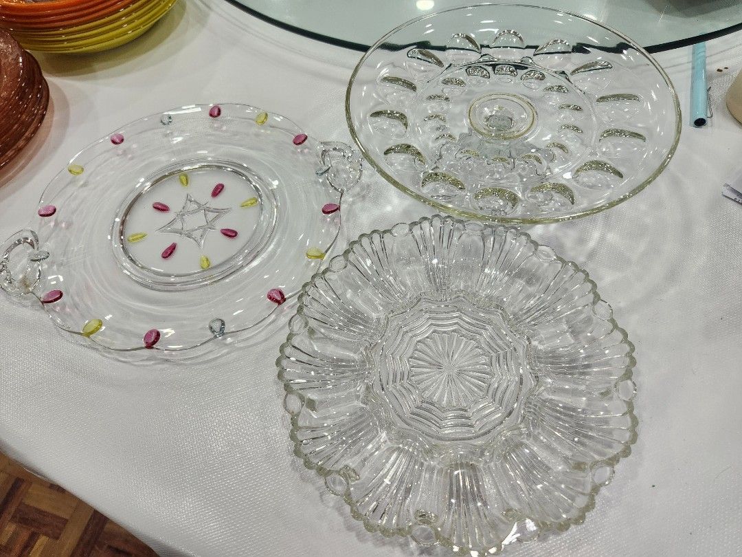 Vintage Glass Serving Dishes (Category: Dinnerware & Cutlery) located in San Juan City. Submitted by iamryn (Listing ID 1407269319, Image 1). Description: Can only be sold as a set 1. Floral glass serving platter (10") 2. Color dotted glass serving platter (13") 3. Elevated glass cake or serving stand (9.5" diameter, 4" height) .