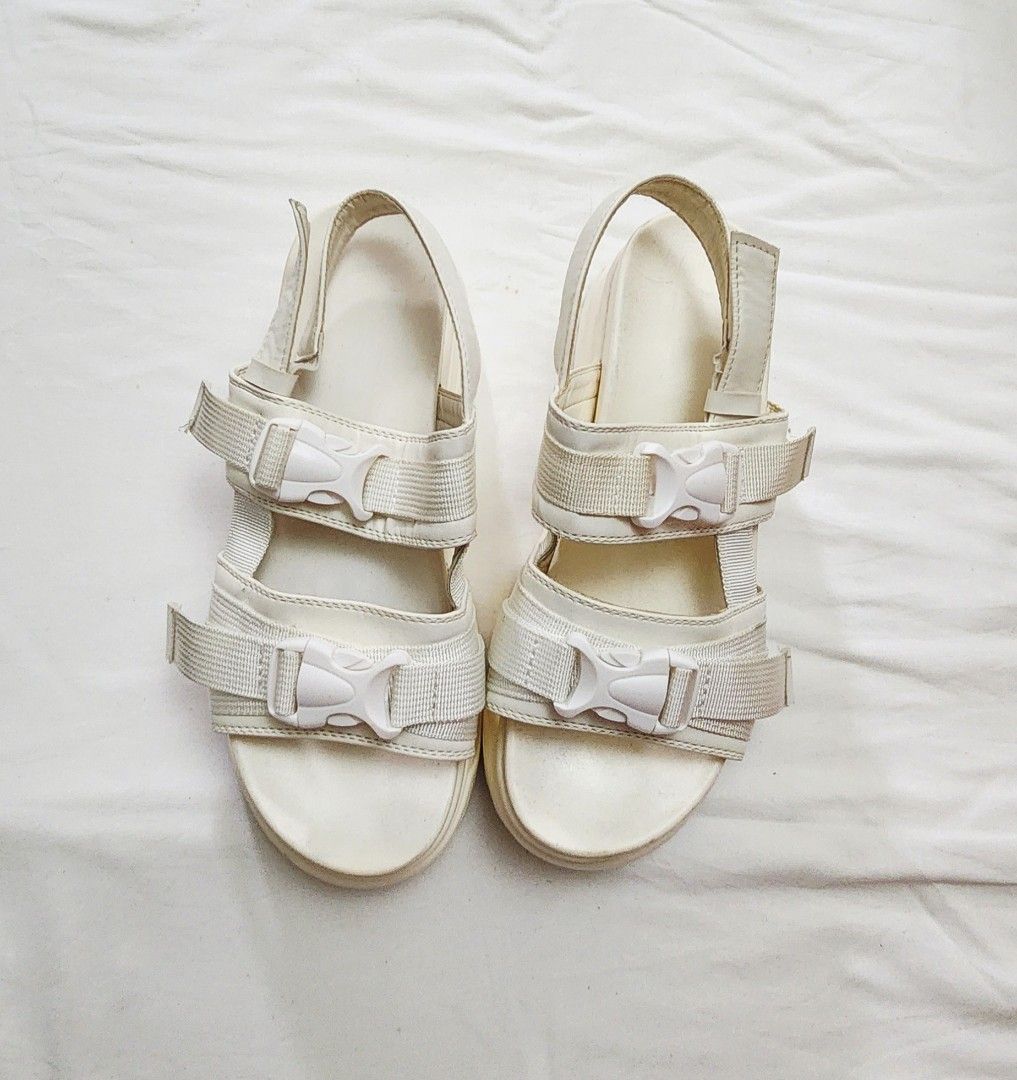 White chunky platform sandals with buckle fastenings (Category: Flats & Sandals) located in Caloocan City. Submitted by celonessentials (Listing ID 1407246069, Image 1). Description: no brand i think i bought this at H&M, not sure, sorry no stains.