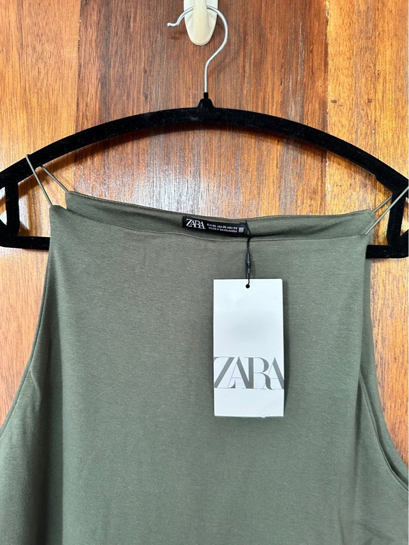 ZARA Fitted Strappy Halter Dress (Category: Dresses) located in Quezon City. Submitted by oreorheo (Listing ID 1407221144, Image 1). Description: - Never worn, with tag -Khaki, Stretchy fabric -Perfect for casual and occasions -DM for more details. -MOP Gcash - Delivery fee shouldered by buyer. - Lalamove/Grab/GogoXpress .