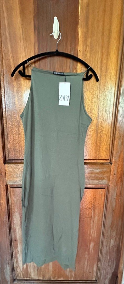 ZARA Fitted Strappy Halter Dress (Category: Dresses) located in Quezon City. Submitted by oreorheo (Listing ID 1407221144, Image 2). Description: - Never worn, with tag -Khaki, Stretchy fabric -Perfect for casual and occasions -DM for more details. -MOP Gcash - Delivery fee shouldered by buyer. - Lalamove/Grab/GogoXpress .