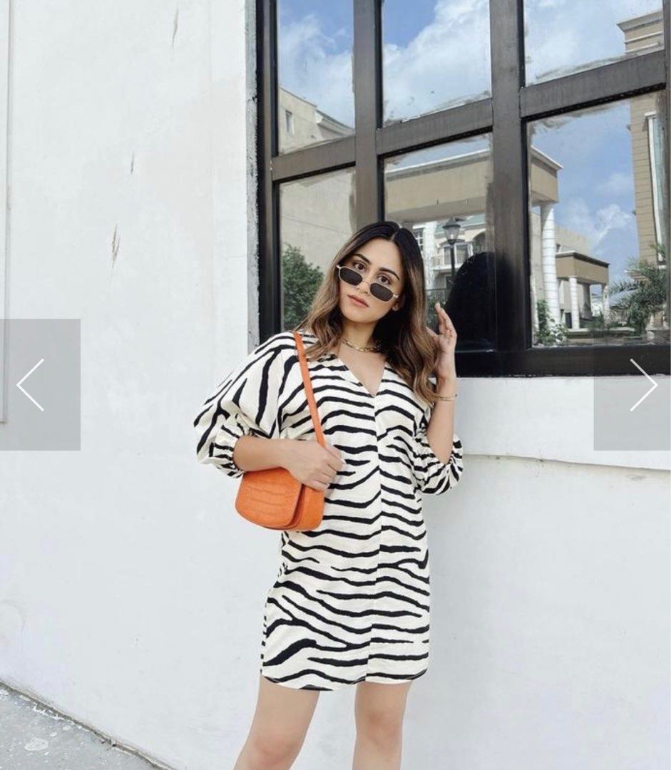 Zara Zebra Print Mini Dress (Category: Dresses) located in Pasay City. Submitted by sandybuggy (Listing ID 1407353160, Image 1). Description: - Zebra print mini dress - V-neckline - Short, voluminous sleeves - Lightweight fabric - Ideal for warm weather - Dress it up or down Bought from another caroseller but dress is too short for me.
