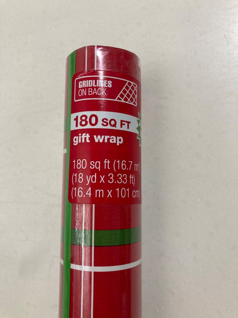 180 sq ft Gift Wrapper (Category: Craft Supplies & Tools) located in Quezon City. Submitted by summer2yu2 (Listing ID 1408923267, Image 1). Description: New gift wrap roll with gridlines on the back. It is 180 sq ft (16.7 m) or 18 yd x 3.33 ft (16.4 m x 101 cm). The gift wrap features a red and green plaid design..