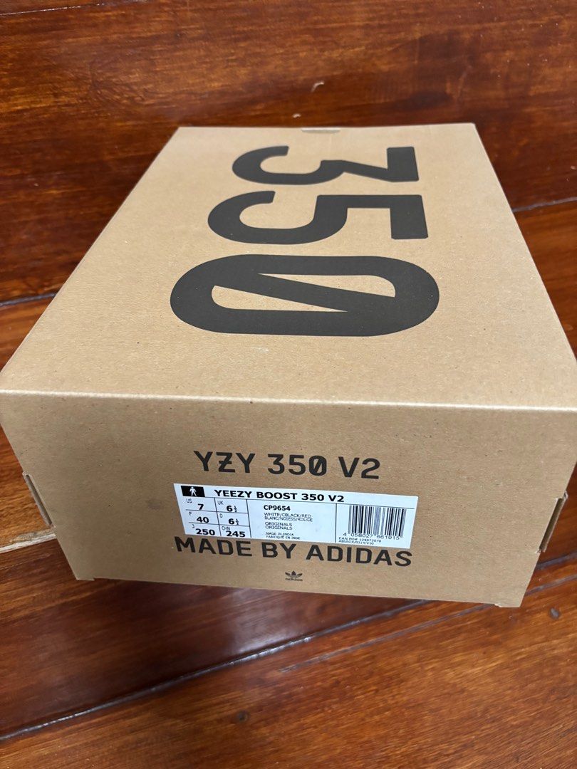 Adidas Yeezy Boost 350 V2 Zebra (Category: Sneakers) located in Caloocan City. Submitted by kangulo (Listing ID 1408949716, Image 2). Description: Adidas Yeezy Boost 350 V2 Zebra sneakers. Features a white and black striped Primeknit upper with a white midsole. The iconic "SPLY-350" text is visible on the side. Comes with the original box. Size US 7..