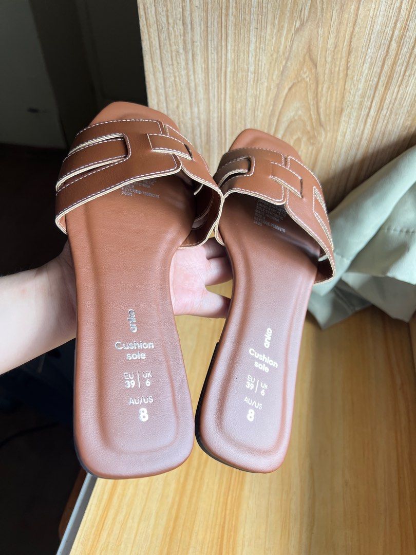 Anko Brown Cushion Sole Sandals Size 8 (Category: Flats & Sandals) located in Manila. Submitted by bea-shop (Listing ID 1408987943, Image 2). Description: - Brown Aniko sandals - Size 8 (EU 39, UK 6) - Square toe design - White stitching details - Flat sandals - Cushion sole.