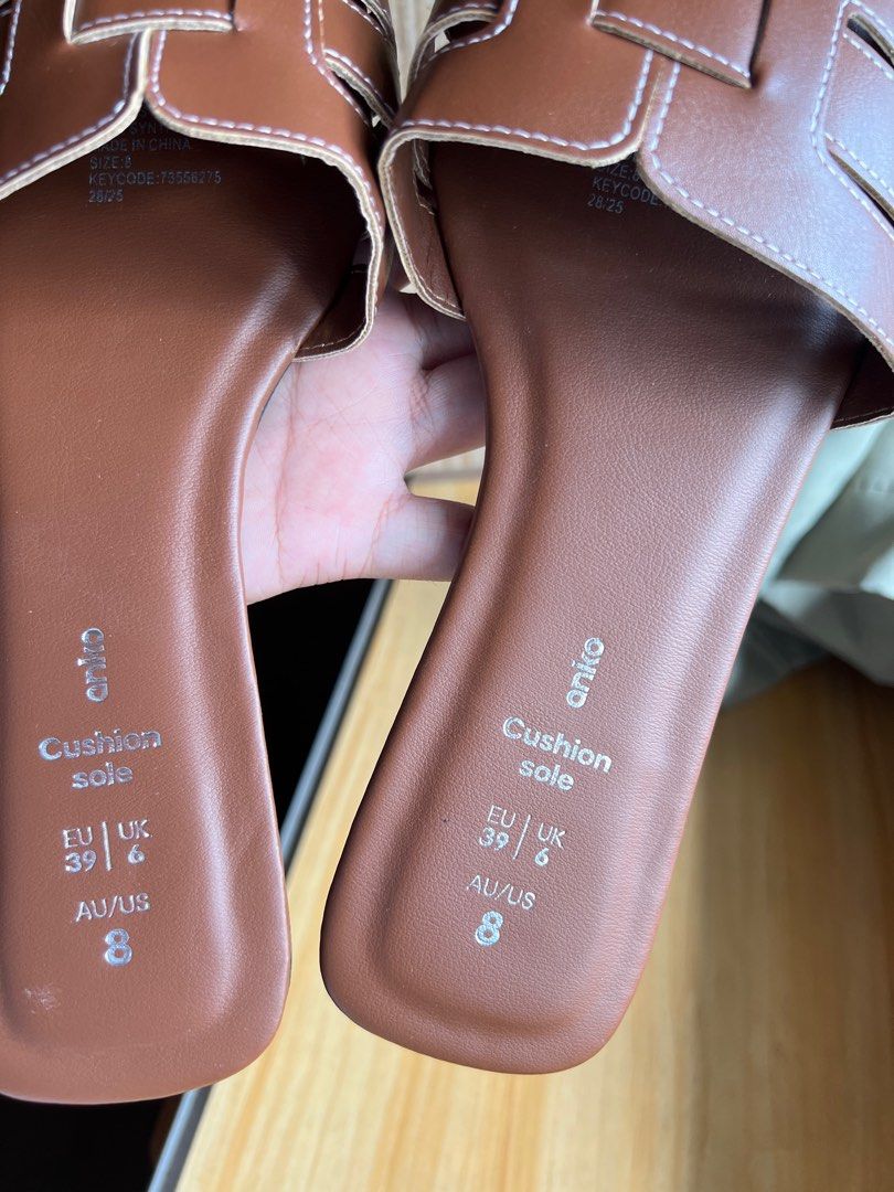 Anko Brown Cushion Sole Sandals Size 8 (Category: Flats & Sandals) located in Manila. Submitted by bea-shop (Listing ID 1408987943, Image 3). Description: - Brown Aniko sandals - Size 8 (EU 39, UK 6) - Square toe design - White stitching details - Flat sandals - Cushion sole.