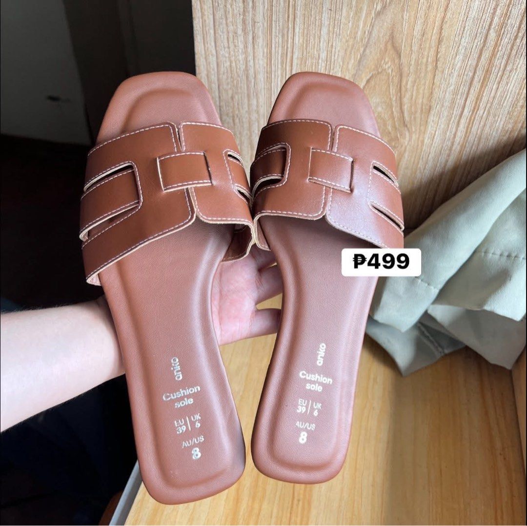 Anko Brown Cushion Sole Sandals Size 8 (Category: Flats & Sandals) located in Manila. Submitted by bea-shop (Listing ID 1408987943, Image 1). Description: - Brown Aniko sandals - Size 8 (EU 39, UK 6) - Square toe design - White stitching details - Flat sandals - Cushion sole.