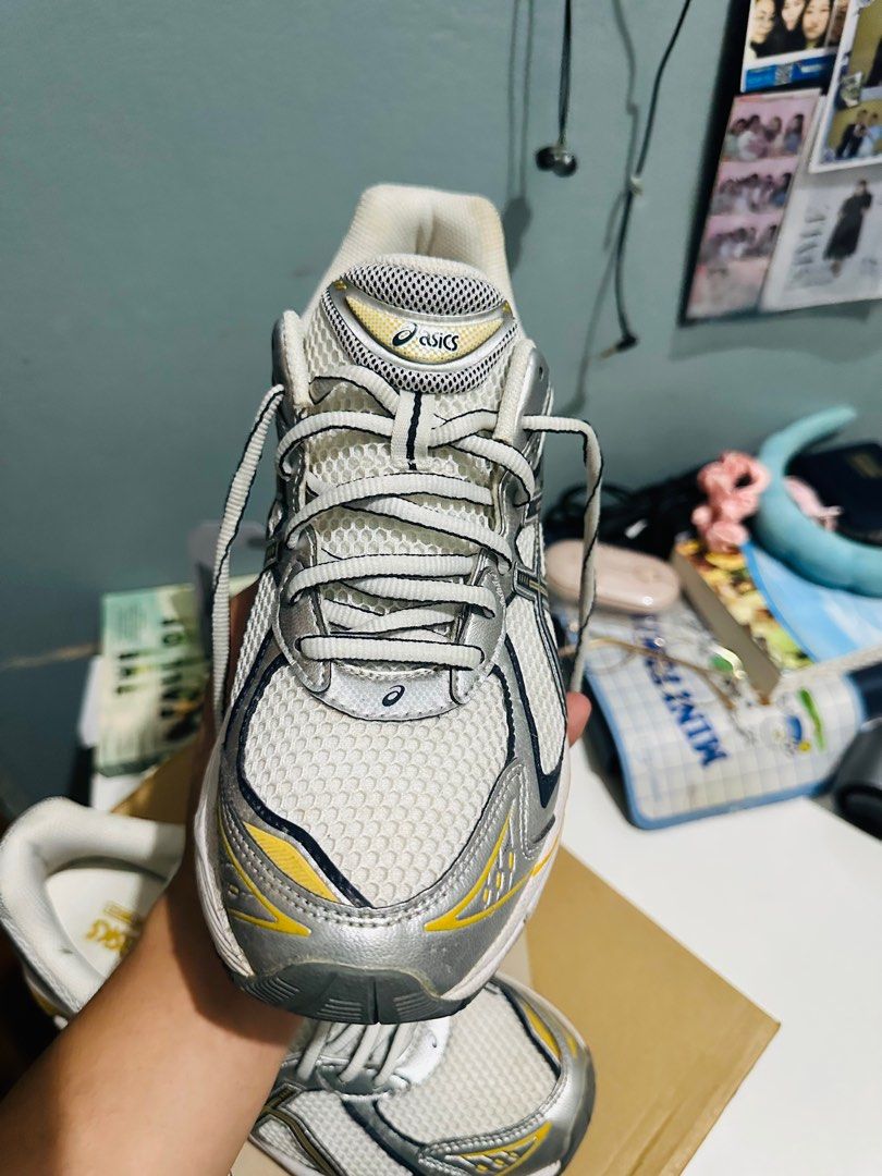 Asics GT-2150 Running Shoes (Category: Sneakers) located in Paranaque City. Submitted by pumpkinhead25 (Listing ID 1409019994, Image 3). Description: - Asics GT-2160 running shoes - Color: White, silver, and yellow - Features the Asics logo - Mesh upper - Lace-up closure - Signs of wear on soles No issue Used once sa mall Still brandnew condition Free shipping Free shipping Free shipping.